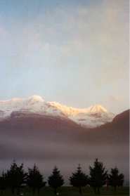 Vertical shot of sunrise on Valdez mountain range.