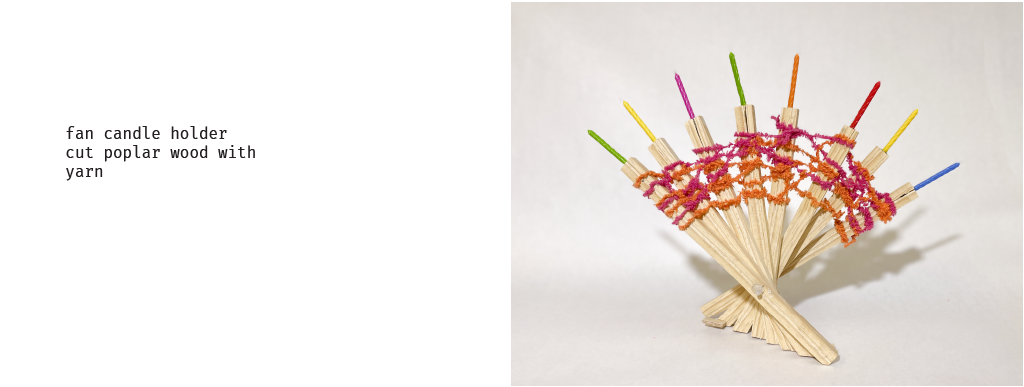 a wooden candelabra shaped like a fan and holding colorful birthday candles